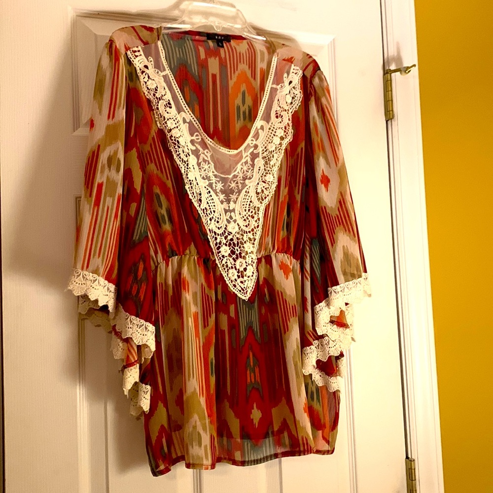 *Multi colored women’s blouse